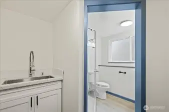 Laundry and 3rd bathroom. Large utility sink and more storage.