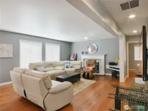 Family/rec room centers around a warm gas fireplace, it's a comfortable surroundings for you to relax, recharge, and connect.