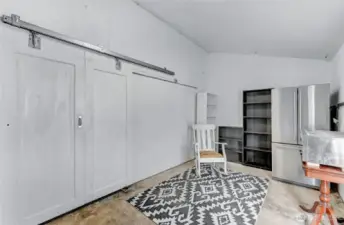 Sitting area into the garage.
