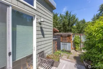 Storage shed next to garden