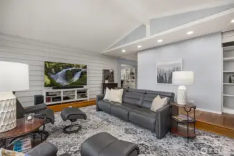 Step down into the spacious sunken living room, a classic 1960s design feature that adds mid-century charm and architectural interest.