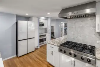 A sleek stainless steel Dacor cooktop offers precision performance and a streamlined look, perfect for the home chef.