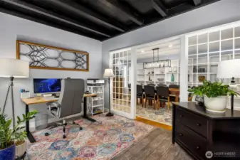 Bright flex room doubles perfectly as a sunlit plant haven, creative studio, or cozy reading nook