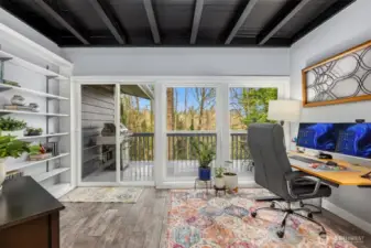 Bright flex room doubles perfectly as a sunlit plant haven, creative studio, or cozy reading nook