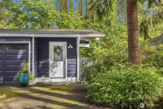 There is an additional office space or storage option next to the garage.