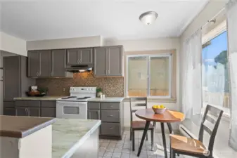 Enjoy a morning bagel or afternoon tea in the sweetest dining nook next to your kitchen. The natural light pours in through large windows and you will love the bright and airy feel.