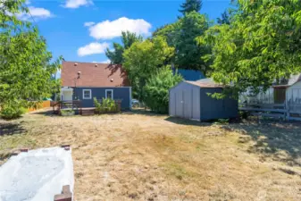 This fully-fenced flat lot has an abundance of space to add garden beds, set up your croquet course or enjoy the surrounding greenery