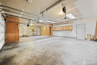 Inside the large 3 car garage.  Lots of cabinets for storage