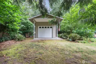 one bay garage/shop with high ceilings, lights, etc. located on the back of the lot