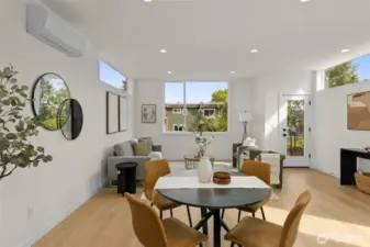 Open-concept living at its finest, where kitchen, dining, and lounge spaces flow together in one harmonious setting.