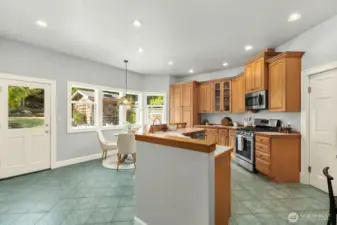 Kitchen w/ casual dining & backyard access