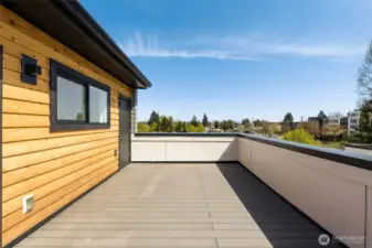 Photos are of model home with similar fixtures & finishes.Floor-to-ceiling windows bathe the living room in sunlight, highlighting the airy proportions and tall ceilings. Photos are of model home with similar fixtures & finishes.