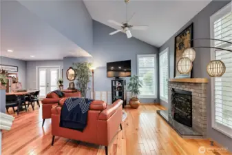 Spacious Living room with Vaulted Ceiling, fan, & Gas Fireplace!