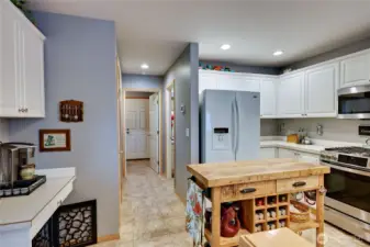 Perfect Coffee station on the left, walk-in pantry is just beyond kitchen on the left.