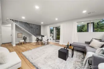 Beautoiful family room downstairs with walk out covered patio.