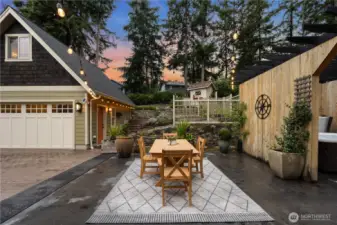 Outdoor living shines w/ multiple gathering spaces...