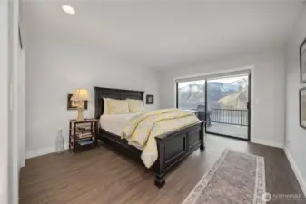 Large primary suite with access to deck and massive view.