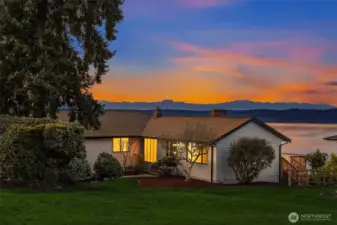The Olympics' snowed caps are profiling in the background.