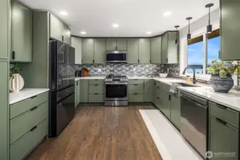 Fully remodeled for aesthetics and functionality, the kitchen is the ideal spot for gathering with friends.