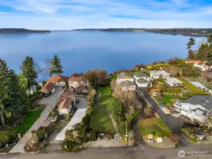 Picinic area and gated entrance to the path/stairs to the beach.