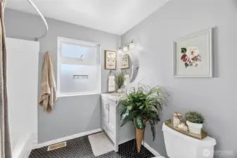Full Bathroom with updated tile flooring
