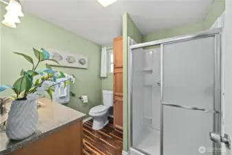 Bathroom designed for comfort and convenience with ample storage.