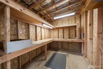 Workshop located behind the largest outbuilding - has lots of electrical outlets and lights.