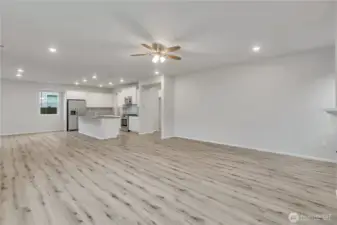 From the living room, enjoy the view of the modern island kitchen.