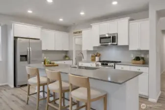 Stylish island kitchen designed for cooking and entertaining  - Virtual stage.