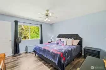 Large primary suite with walk-in closet and en-suite.