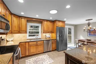 light & bright updated kitchen has tile flooring