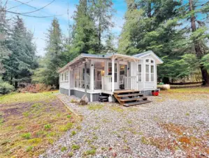 Treed surroundings offering privacy throughout the lot