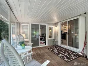 The entrance begins with a covered porch