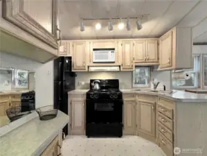 Kitchen area w/ full-size appliances