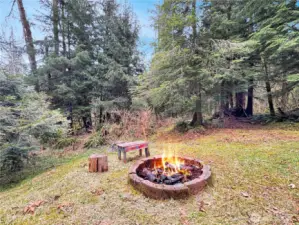 Large fire pit located to the rear of th eproperty