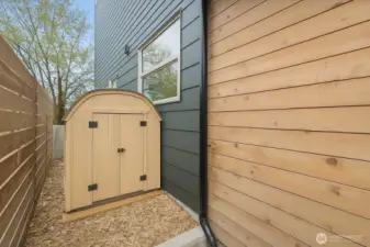 Side-yard perfect for pet relief, raised garden bed, or a shed for outdoor gear storage! (Virtuall staged).