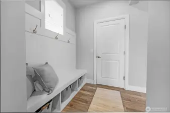 quaint mudroom concept as you enter from the garage