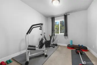 Upper level bedroom being used as a workout room, very spacious