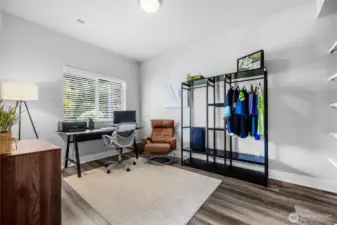 Lower level bedroom with greenbelt view