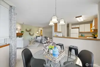 Dining area looking towards living room and kitchen