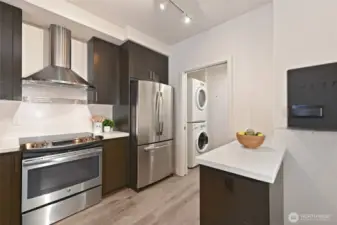 all stainless steel appliances and separate laundry room