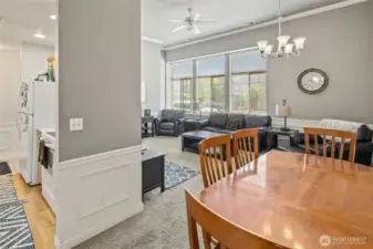 Looking from dining area towards kitchen and living room.