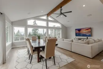 Impressive walls of windows frame the views and let in an abundance of natural light.