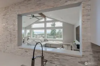 The cutout in the kitchen makes the most of this stunning view.