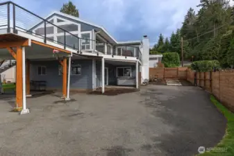 2 driveways with ample space for cars, RV or other toys.