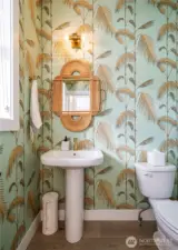 Powder Bath: Wall paper theme, (not shown: storage closet, & the backlit  wine rack.