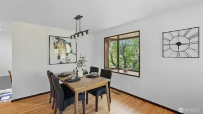 Enjoy meals in this stylish dining room highlighted by a charming bay window.