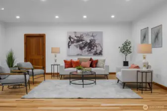 Great room with door that leads to the laundry room