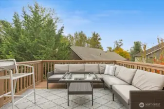 Seamless indoor-outdoor flow with a spacious deck for gatherings.