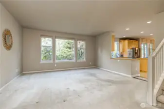 Spacious family room features excellent view of the beautiful back yard